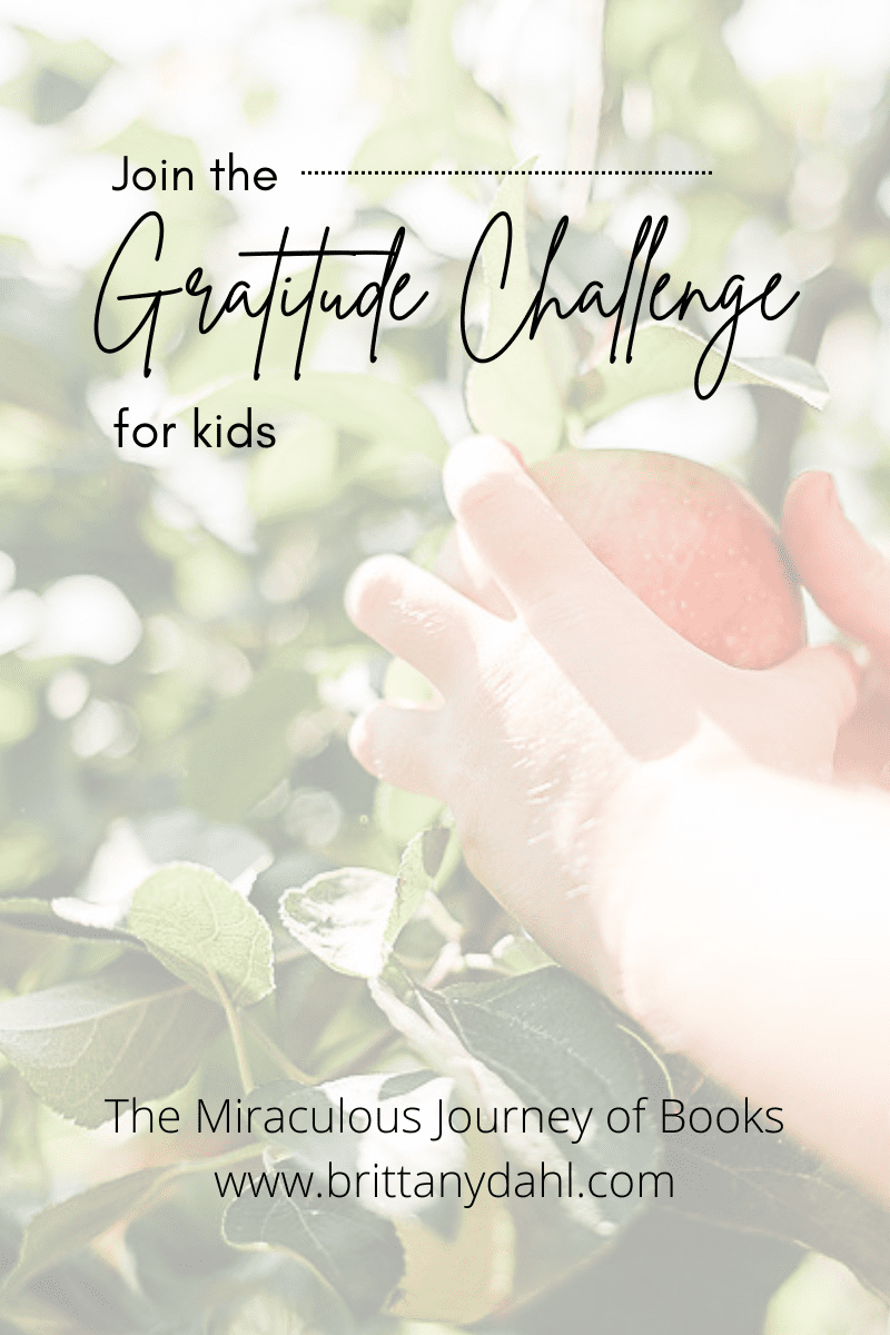 Join the Gratitude Challenge for Kids. The Miraculous Journey of Books. www.Brittanydahl.com. Image of child picking an apple from a tree.