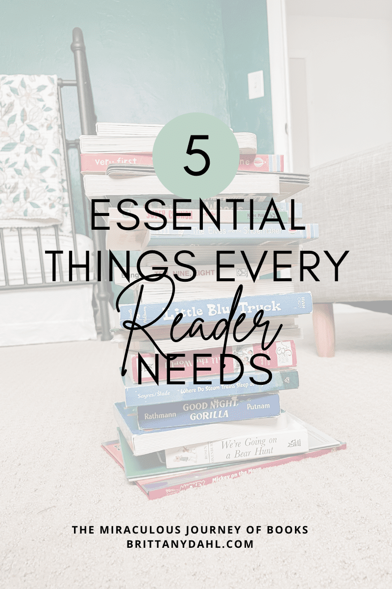5 Essential Things Every Reader Needs. The Miraculous Journey of Books at BrittanyDahl.com. Image of stack of books on a floor. Crib in the background.