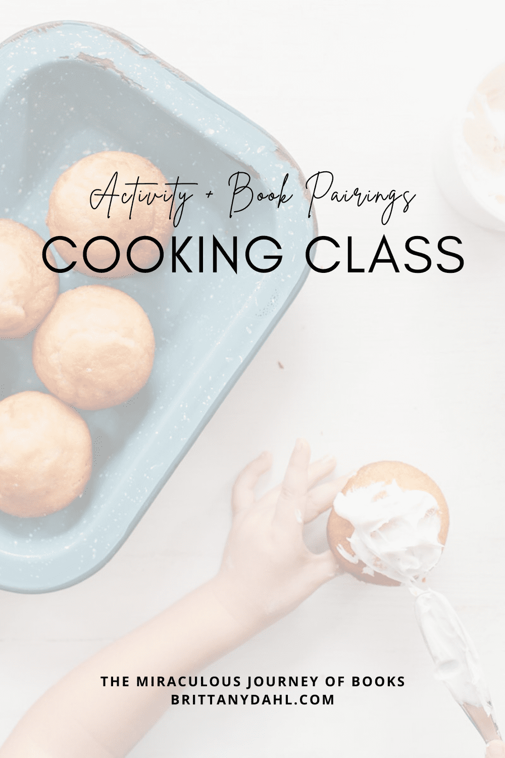 Activity and Book Pairings: cooking class from The Miraculous Journey of Books at BrittanyDahl.com. Image of child's hands and cupcake. The child is putting vanilla icing on the cupcake with a butter knife.