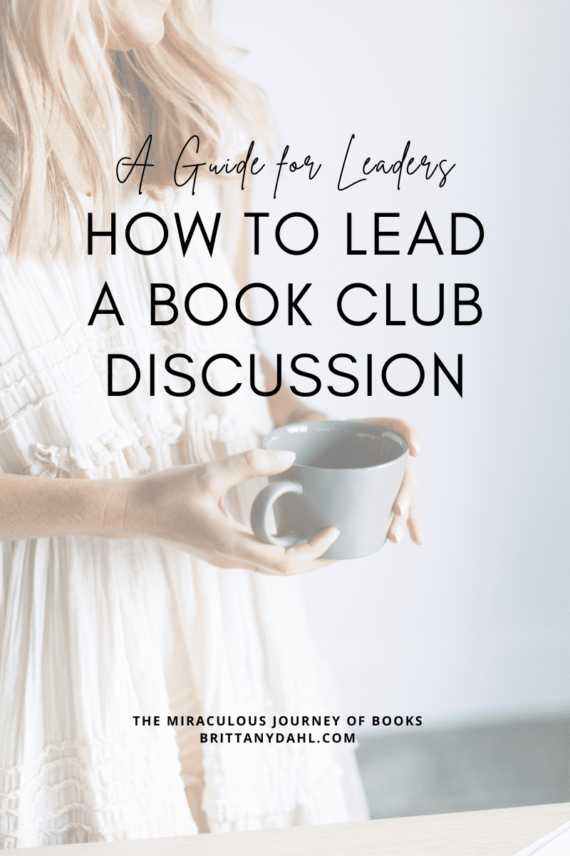 A Guide for Leaders: How to lead a book club discussion. Image of woman wearing a cream colored dress and holding a gray coffee mug. Post from The Miraculous Journey of books at BrittanyDahl.com