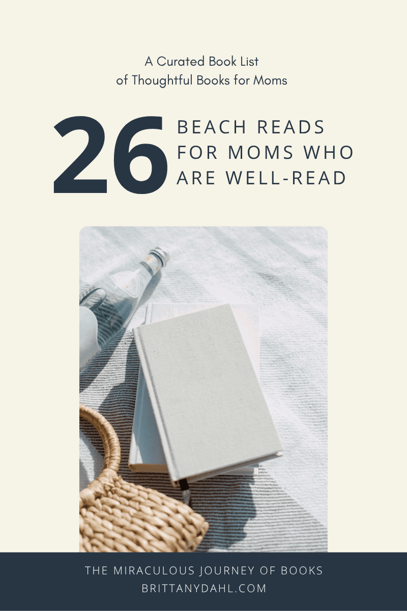 Image of a book with no title visible. The book is on a blanket next to a woven bag and a bottle of water. The sun is intense, so the image appears to be taken outside.